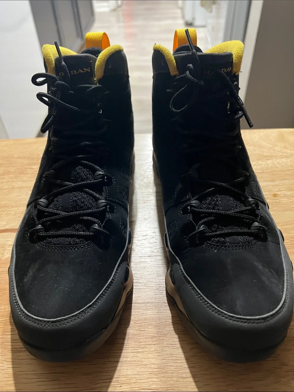 Jordan Black High-Top Sneakers with Yellow Trim